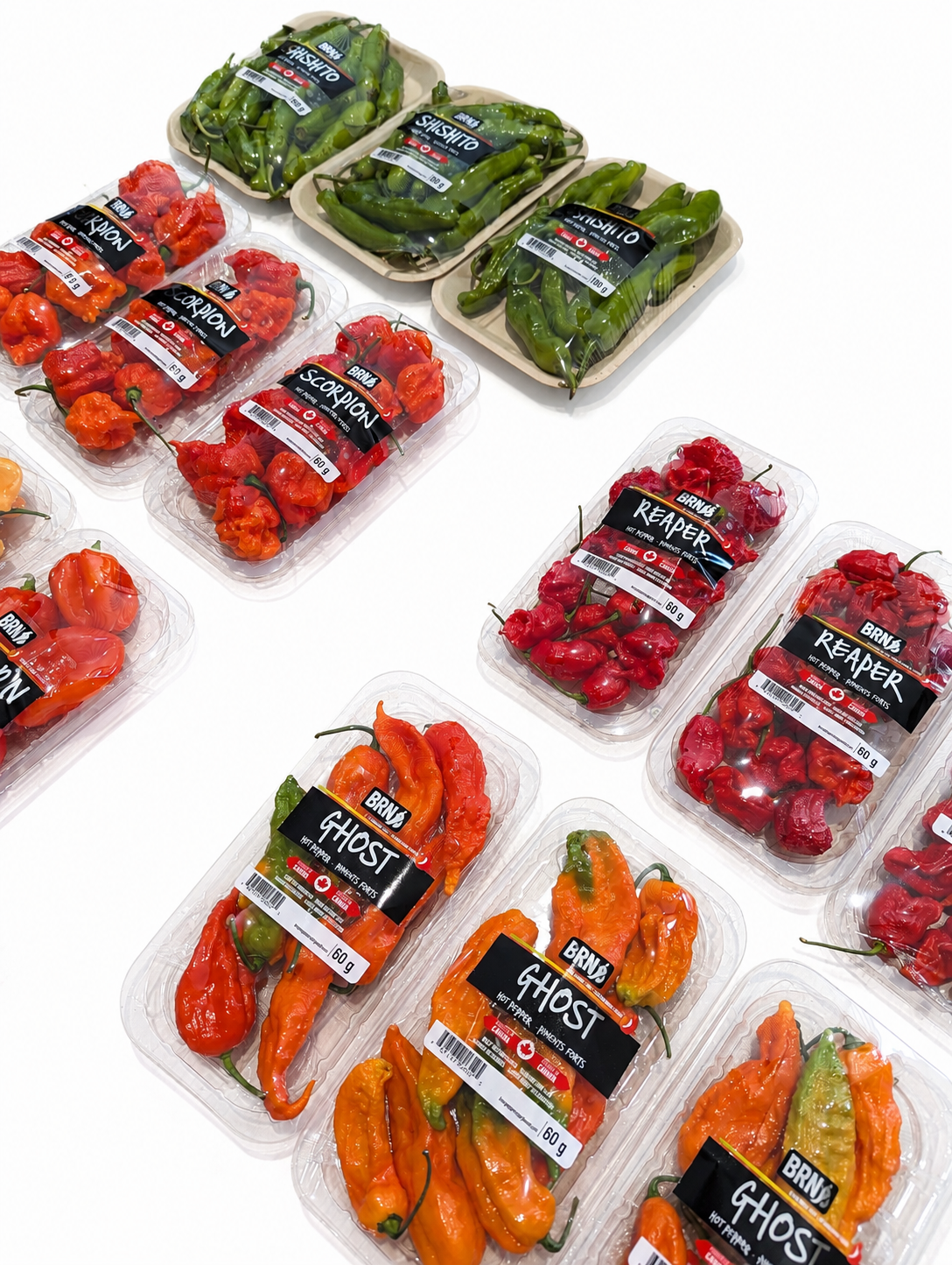 BRN Shishito, Scorpion, Reaper, and Ghost peppers in branded retail packs